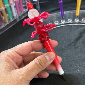 Red and White Decorative Pen